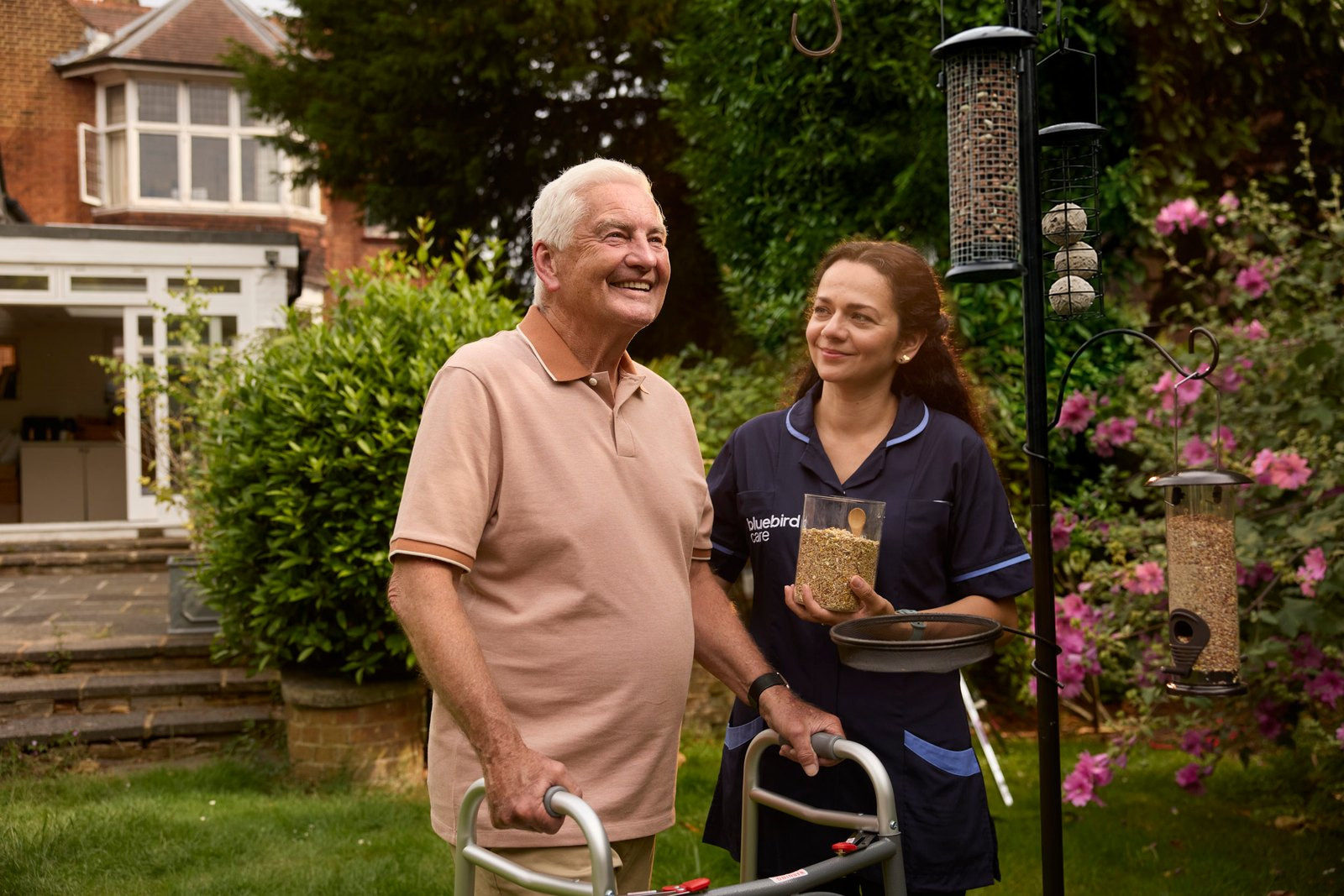 A carer and a client in the garden, a 30-second Bluebird Care story